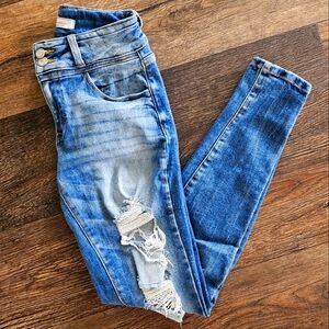 Kan-Can Mid-rise curvy skinny w/ double-button closure